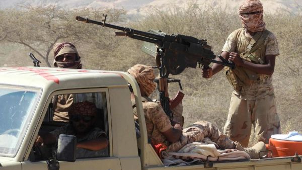 Yemeni fighters loyal to the government ride in the back of a pickup truck while closing in on a suspected location of an Al Qaeda in the Arabian Peninsula (AQAP) leader in February. Saleh Al Obeidi / AFP