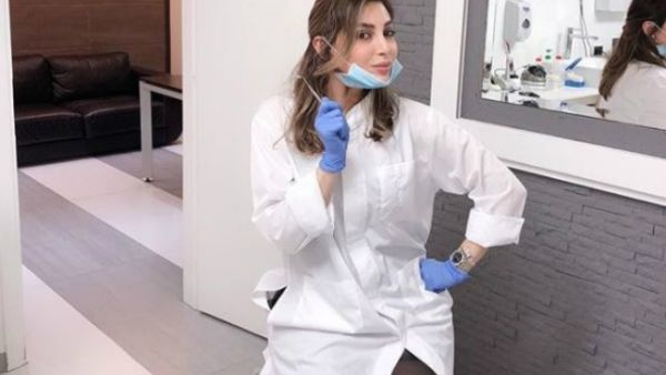 In the picture that Yara posted she is wearing a white lab coat and sitting inside her dentist's clinic, hinting she might have changed her job. (Source: Yara - Instagram) 