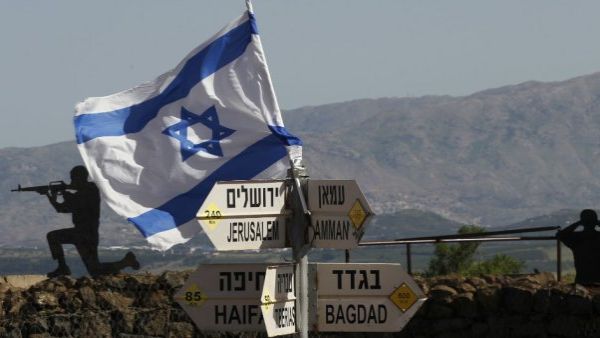 An Israeli flag is seen placed on Mount Bental in the Israeli-occupied Golan Heights on May 10, 2018. (AFP/ File)