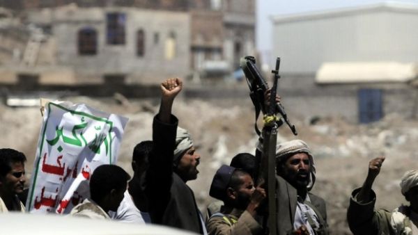 Houthi rebels celebrate the capture of the capital last month (AFP/ File Photo)
