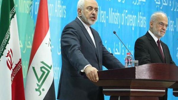 Iranian Foreign Minister Mohammad Javad Zarif (L) speaks during a press conference with Iraqi Foreign Minister Ibrahim al-Jaafari in the Iraqi capital Baghdad on February 24, 2015. (AFP)