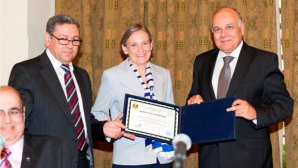 Dr. Amr Salama, Minister of Higher Education; Dr. Lisa Anderson, AUC president and Dr. Magdi Qassem, head of NAQAAE Dr. Amr Salama, Minister of Higher Education; Dr. Lisa Anderson, AUC president and Dr. Magdi Qassem, head of NAQAAE