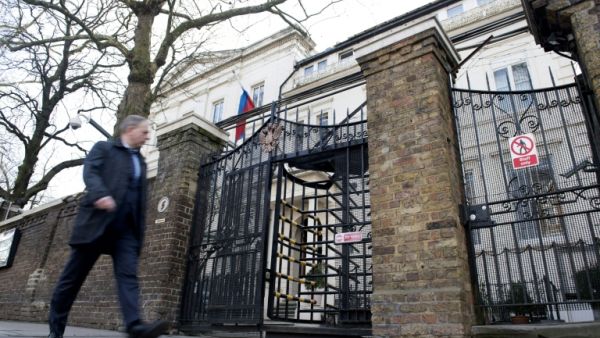 A man passes near the Russian embassy in London (AFP/File Photo)	