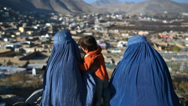 Afghan women overlook their town. (AFP/File)