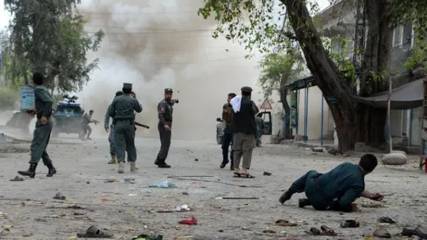 Security personnel observe the area after a second explosion following a suicide attack in the eastern Afghan city of Jalalabad on April 18, 2015. (AFP/File)