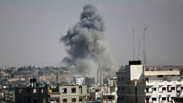 Smoke rises following an Israeli strike (AFP/File Photo)