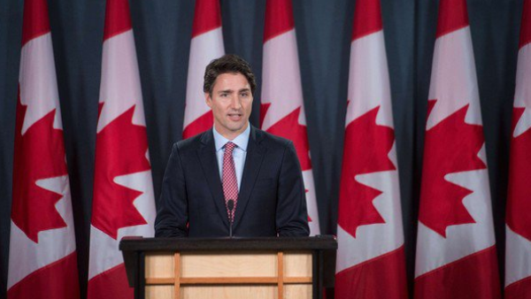 Canada may not reach the goal it set earlier this year for Syrian refugees, but they're still doing more than the US. (AFP/File)