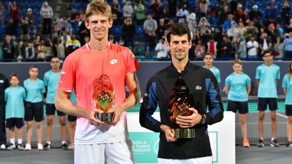 Serbia's Novak Djokovic and South Africa’s Kevin Anderson pose at the end of the Mubadala World Tennis Championship 2018 in Abu Dhabi, on December 29, 2018. Djokovic won a fourth Mubadala World Tennis Championship title, coming back from a set down to beat Kevin Anderson 4-6, 7-5, 7-5.
GIUSEPPE CACACE / AFP
