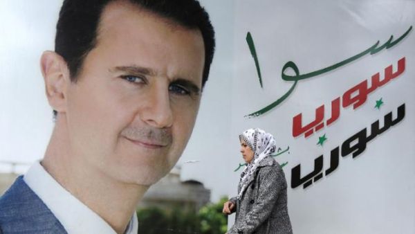 Syrian President Bashar al-Assad has dismissed two high-ranking officials after a violent argument, AFP reported Friday. (AFP/File) 