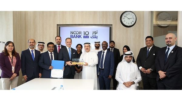 Noor Bank Team with Abdulqader Obaid Ali Chairman of UAE IAA.