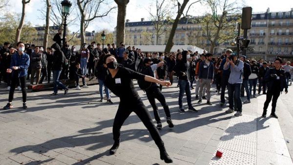 صدامات بين الأمن ومتظاهرين نددوا بقتل صيني على يد شرطي