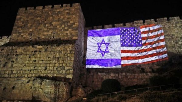 A giant US flag screened alongside Israel's national flag (AFP/File Photo)
