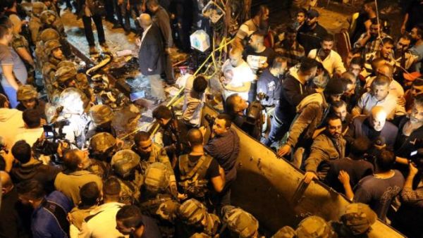 Crowds gathered at the site of twin bombings in Beirut in November, 2015. (AFP/File)