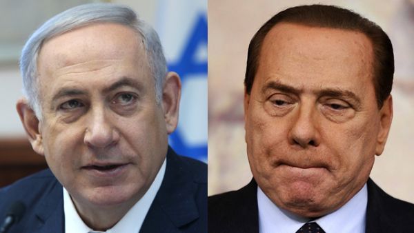 Prime Minister Benjamin Netanyahu (right) and former Italian President Silvio Berlusconi. (AFP/File)