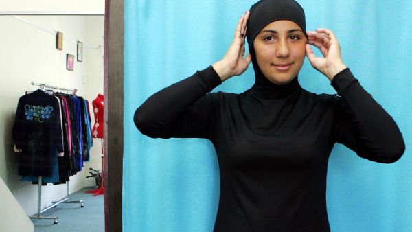 This file photo taken on January 12, 2007 shows Australian model Mecca Laalaa wearing an Islamic swimsuit (or burkini) by Muslim fashion designer Aheda Zanetti at the Islamic Sport & Swimwear shop in Sydney. (AFP/Anoek de Groot)