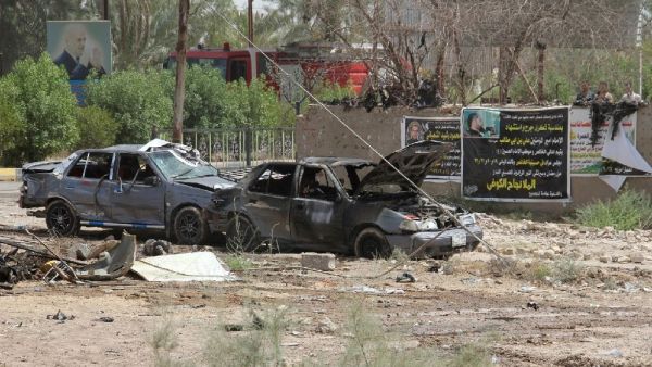 The remains of a car bomb. (AFP/Younis al-Bayati)