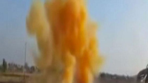 Conflicting reports about the Latakia explosion make it unclear what struck the coastal city with clouds of orange smoke. (Twitter)