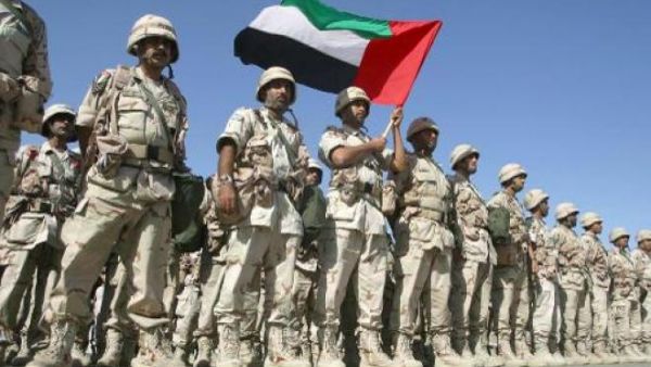 A contingent force from the UAE stand at ease on the tarmac of Kuwait International Airport on Feb. 23, 2003. (AFP/File)