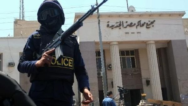 A Egypt security officer stands guard in front of a newly-built courthouse in Egypt. (AFP/File)
