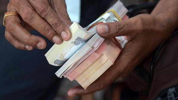 When you are an Abu Dhabi overnight 'Big Ticket' millionaire you can afford to take time to count your money (AFP/File Photo)	