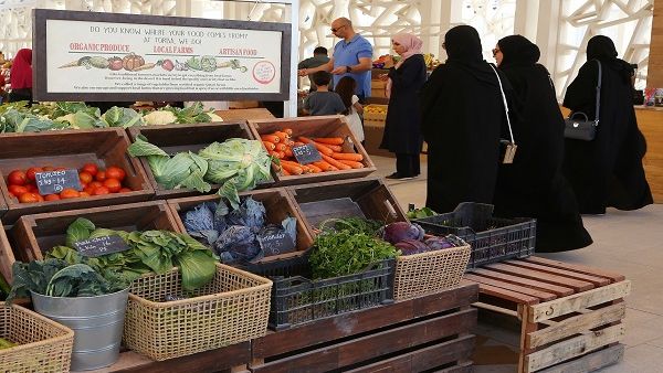 Members of the community visit Torba Farmers Market in Qatar Foundation’s Education City