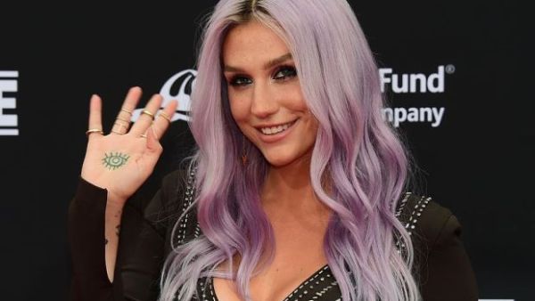 Kesha is teaming up with Macklemore for a 30-city joint tour titled The Adventures of Kesha and Macklemore. (AFP/File)