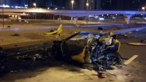 The Ferrari struck a pole and was torn in half from the impact, ejecting the four passengers from the vehicle. (Courtesy Dubai Police)