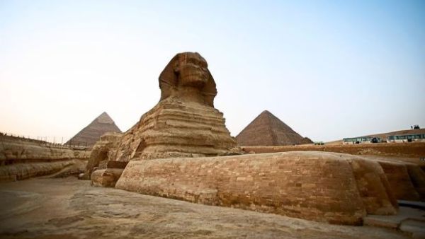 The Sphinx, flanked by the pyramids of Menkaure and Khafre in Giza, on the outskirts of Cairo. (AFP/File)