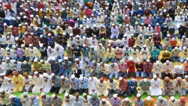 Indian Muslims take part in Eid al-Fitr prayers at the Khairuddin Mosque in Amritsar on June 26, 2017. Muslims around the world are celebrating the Eid festival, marking the end of the fasting month of Ramadan. (Narinder Nanu/AFP)