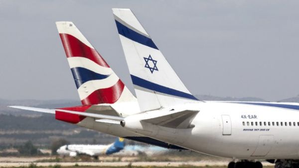 El-Al and British Airways aircraft sit on the ground at Tel Aviv's Ben Gurion International Airport.  (AFP/Jack Guez)