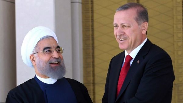 Turkish President Recep Tayyip Erdogan (R) shakes hands with his Iranian counterpart Hassan Rouhani during an official welcoming ceremony at the presidential complex in Ankara on April 16, 2016. (Adem Altan/ AFP) Turkish President Recep Tayyip Erdogan (R) shakes hands with his Iranian counterpart Hassan Rouhani during an official welcoming ceremony at the presidential complex in Ankara on April 16, 2016. (Adem Altan/ AFP)