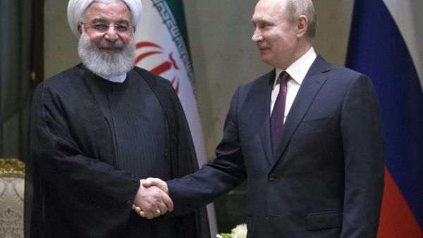 Rouhani and Putin were in Ankara for the summit with Erdogan (AFP/File Photo)