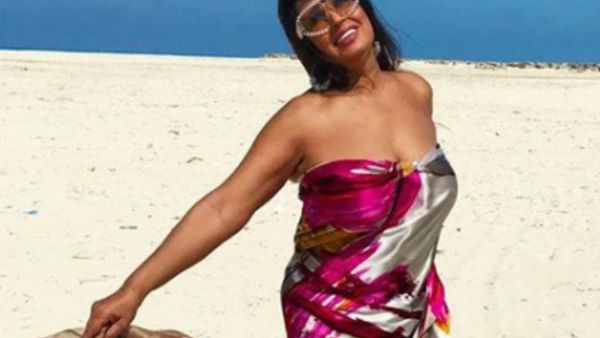 In the latest picture that Fifi shared she appears wearing a long sleeveless dress designed by Emirati designer Mona Al Mansouri. (Source: fifiabdouofficial - Instagram)