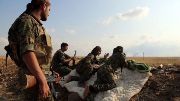 SDF forces post up for their al-Hol offensive, which began Oct 31. (AFP/File)