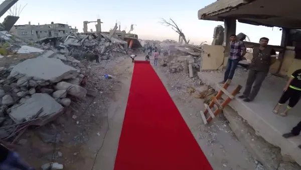 Festival organizers rolled out the Red Carpet in the ruins of a destroyed neighborhood. (YouTube)