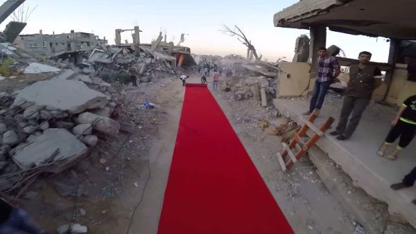 Festival organizers rolled out the Red Carpet in the ruins of a destroyed neighborhood. (YouTube)