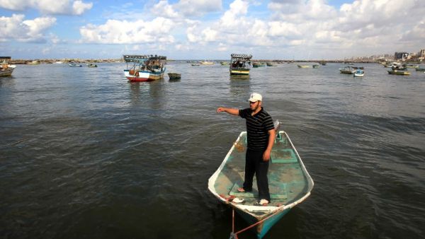 Palestinian fishermen set anchor off the coast of Gaza. (AFP/File) Palestinian fishermen set anchor off the coast of Gaza. (AFP/File)