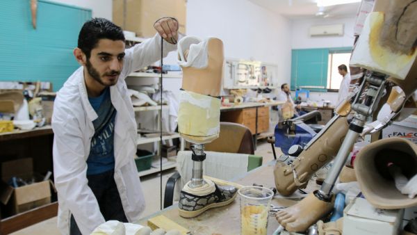 Founded in 1976, Gaza’s Artificial Limbs and Polio Center has seen a dramatic increase in its workload, fitting prosthetic limbs for many people injured during three major Israeli offensives since 2008. Emad Shaat