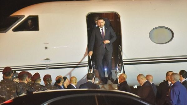 Lebanese President Michel Aoun has yet to accept Hariri's resignation (AFP)