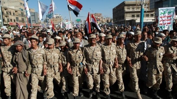 Houthi fighters marched in a demonstration in Sana'a in February. (AFP/File)