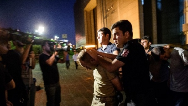 Turkish police arrest soldiers after the failed rebellion July 15. (photo: AFP) Turkish police arrest soldiers after the failed rebellion July 15. (photo: AFP)