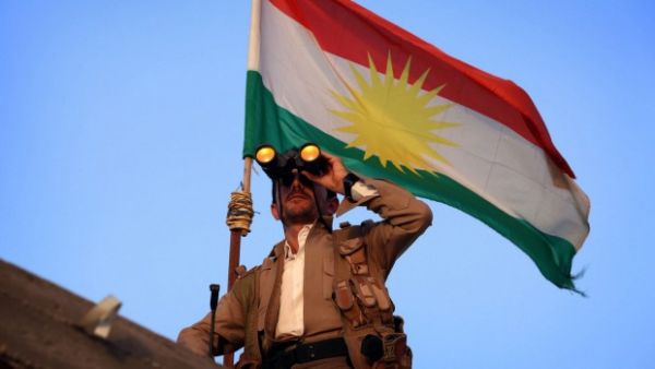 A Kurdish Peshmerga fighter holds a position on the front line in the Gwer district, 40 kilometers south of Erbil. (Photo: AFP)