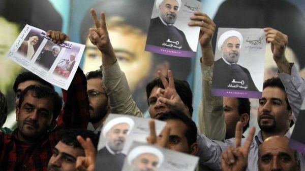 Iranian supporters of President-elect Hassan Rouhani gather at the mausoleum of the founder of Iran's Islamic Republic Ayatollah Ruhollah Khomeini (Atta Kenare / AFP)
