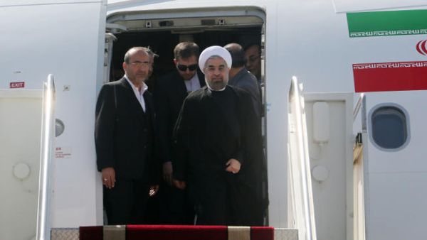 President Rouhani has been greeted by supporters and hardliners after returning to Iran from the U.N. General Assembly session in New York. (Image credit: AFP)