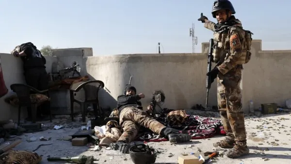 عناصر من الحشد الشعبي خلال اشتباكات مع التنظيم قرب تلعفر- أ ف ب