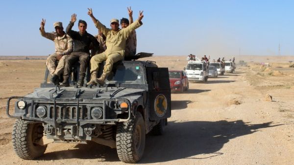 Iraqi forces roll through the Anbar province. (AFP/File)