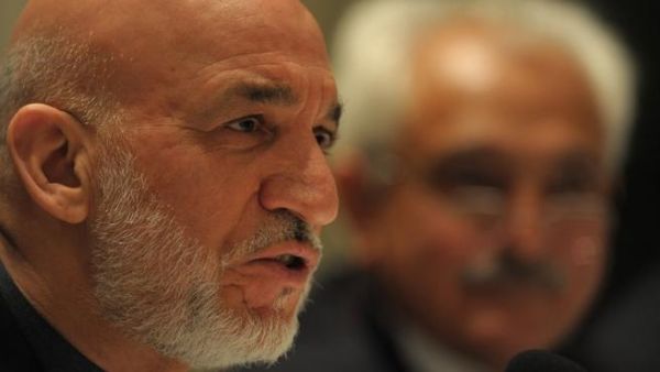 Afghan President Hamid Karzai addresses media representatives during a press interaction in New Delhi on December 14, 2013. [AFP]