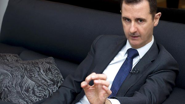 A handout picture released by the Syrian Arab News Agency (SANA) on June 17, 2013, shows Syrian President Bashar al-Assad speaking during an interview (AFP)