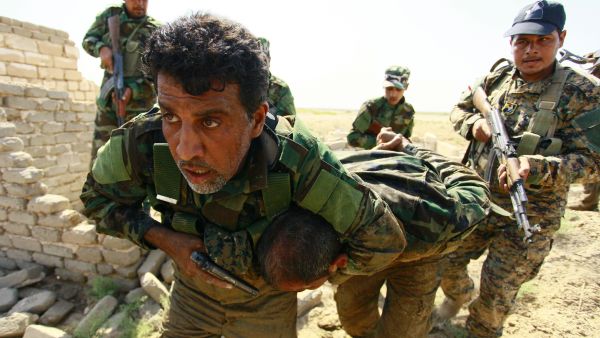 Shi´ite militia (pictured below) supported the Iraqi security forces to retake the town of Amerli (Haidar Hamdani/ AFP).