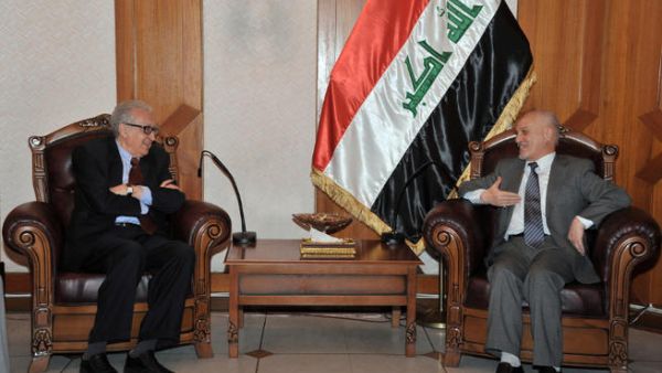 A handout picture released by the Iraqi government shows UN-Arab League envoy Lakhdar Brahimi (L) meeting with Iraq's deputy prime minister in charge of energy Hussain Ibrahim Saleh. (Image credit: AFP PHOTO/HO/IRAQI GOVERNMENT)